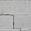Crack in the cement wall caused by foundation problem