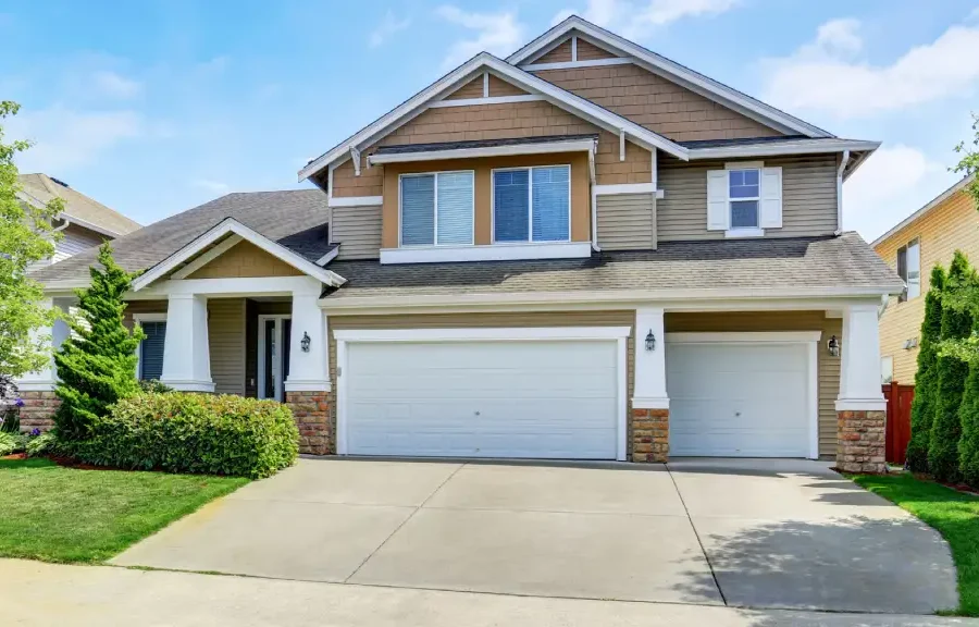 2 Story Suburban Home with manicured lawn