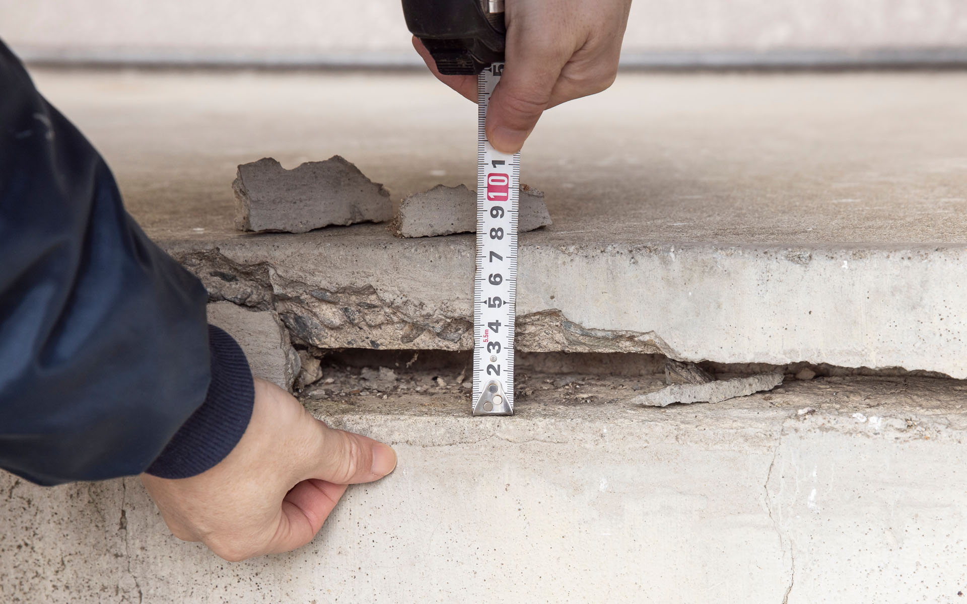Professional Measuring to see if a house is sinking
