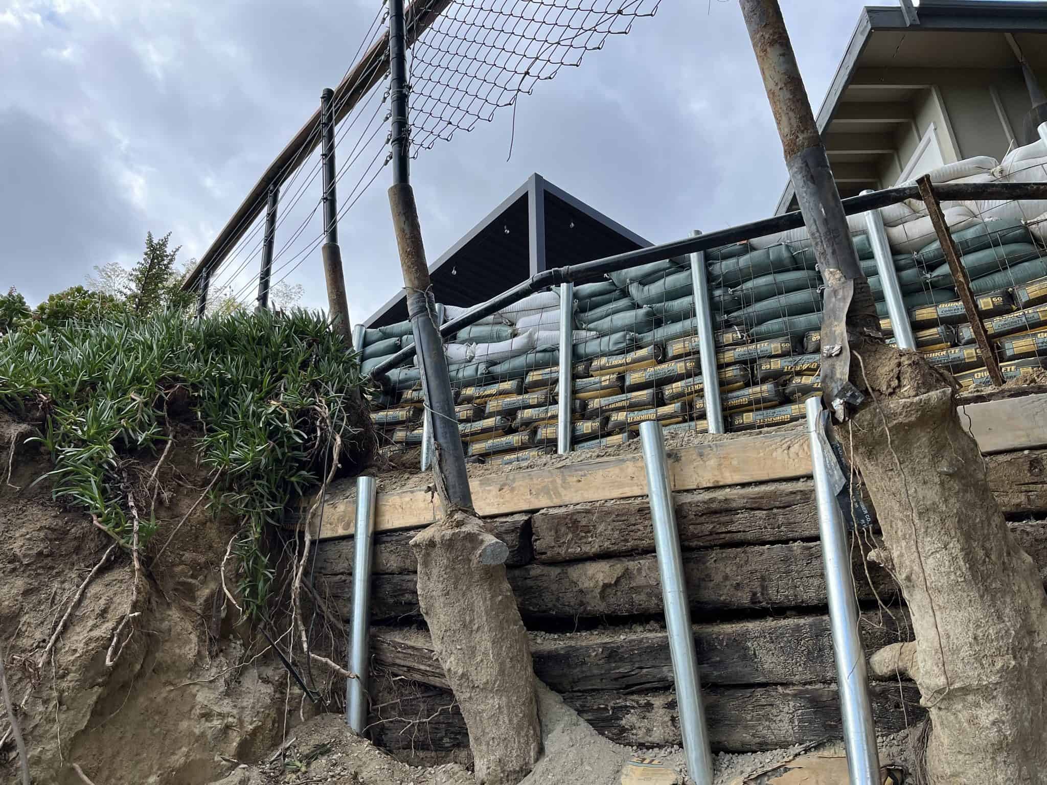 Emergency hillside stabilization after a major erosion event.