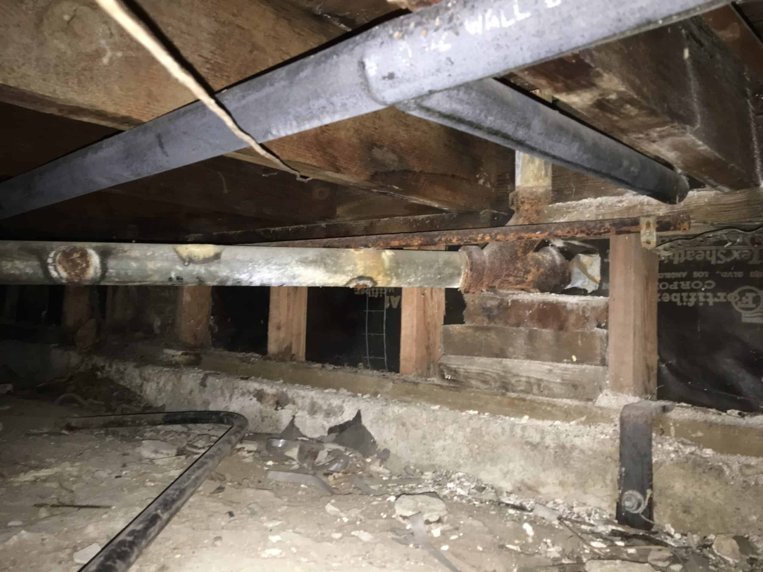 Probable cause of foundation settlement in crawl space
