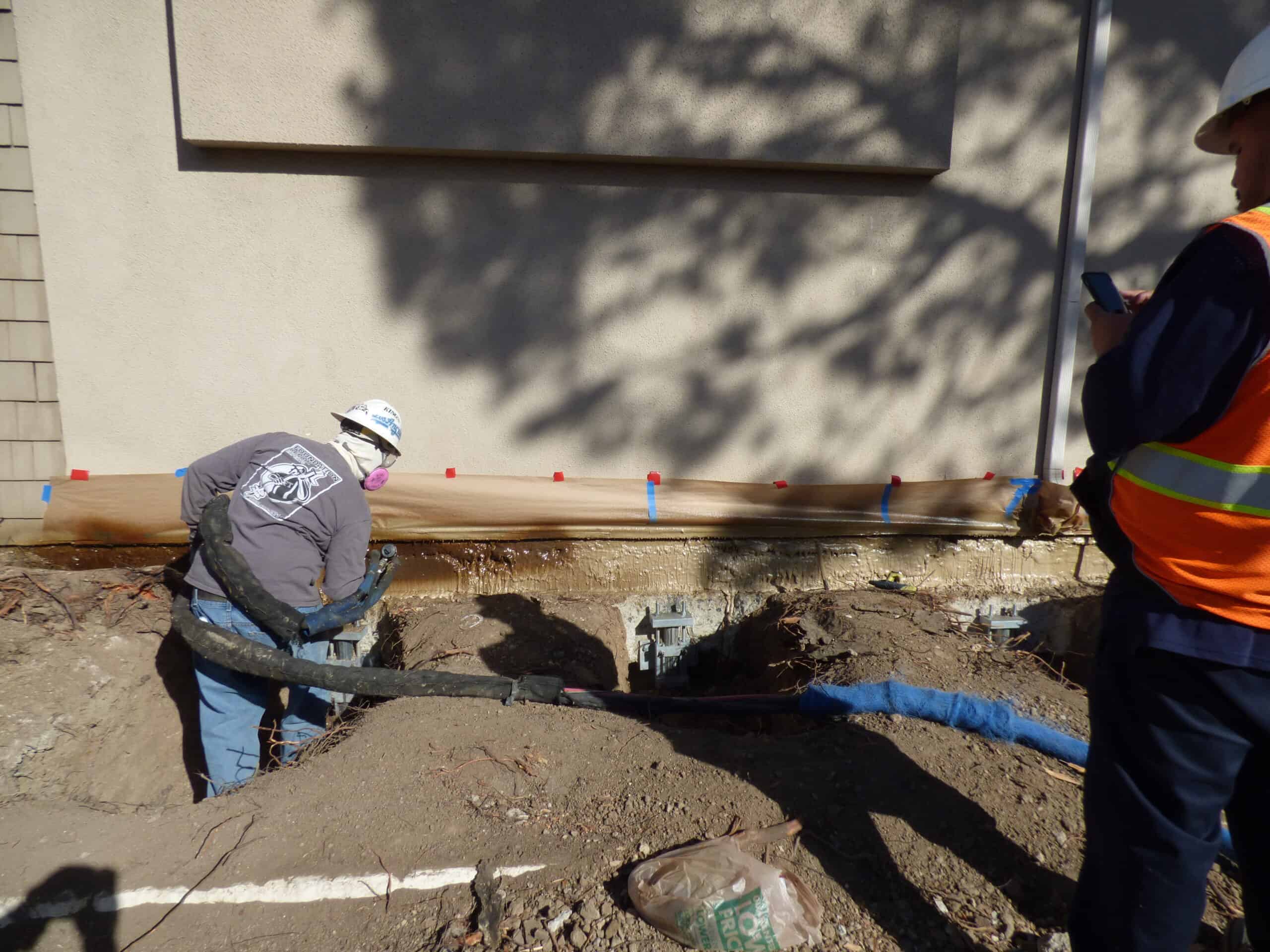 Commercial foundation waterproofing with polyurethane foam.