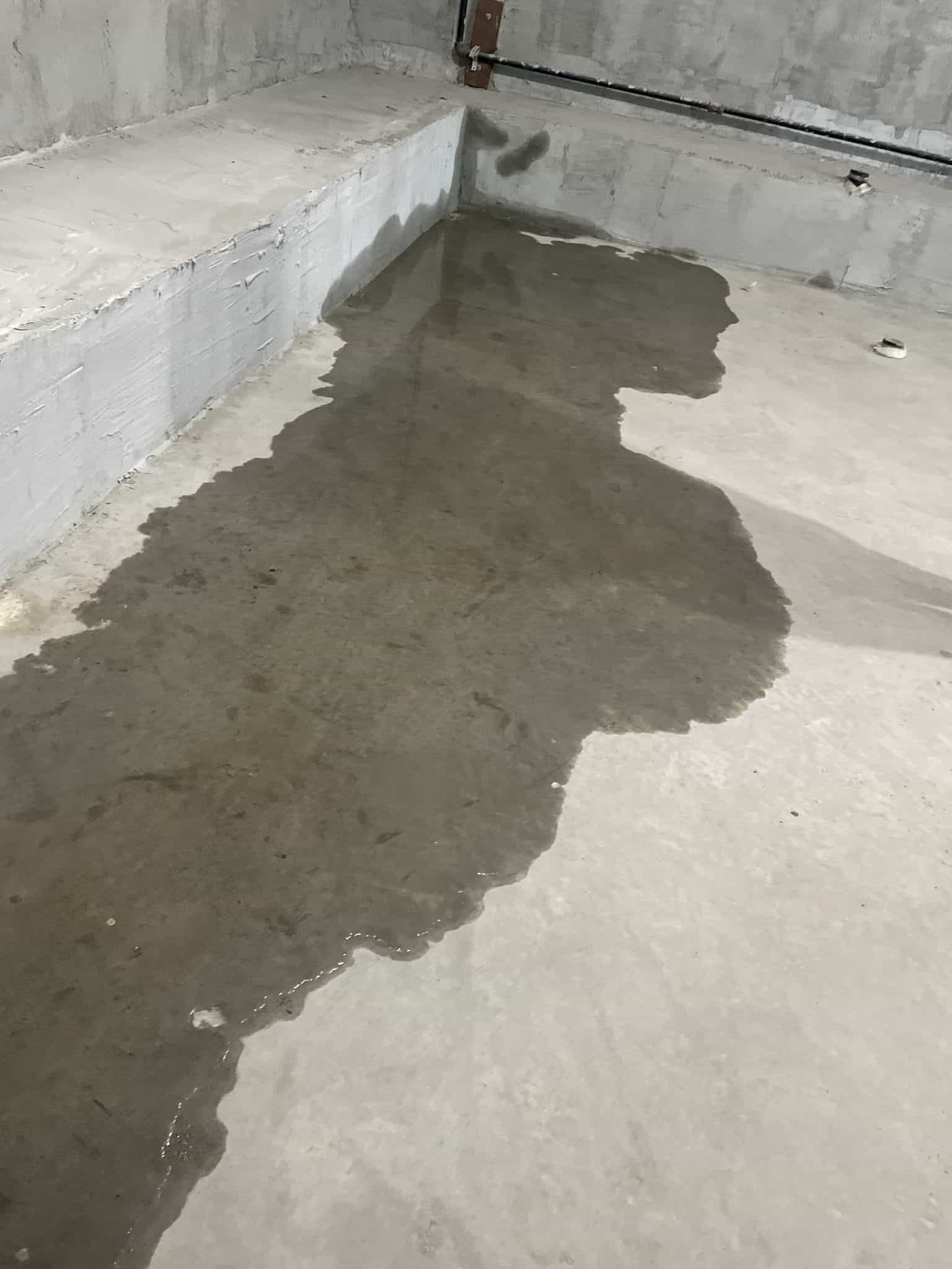 Water leak through a cold joint in a condo parking garage.