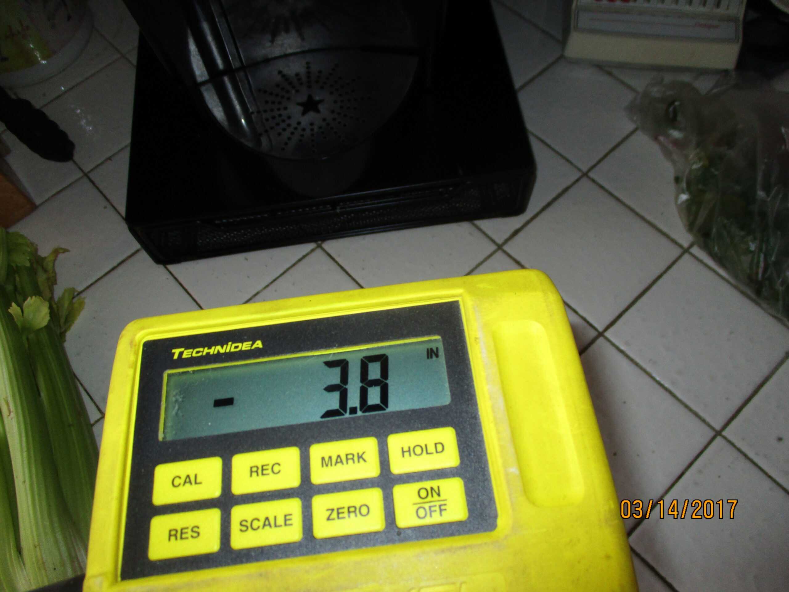 Ziplevel instrument reading showing 3.1 inches of foundation settlement at a Bakersfield home.