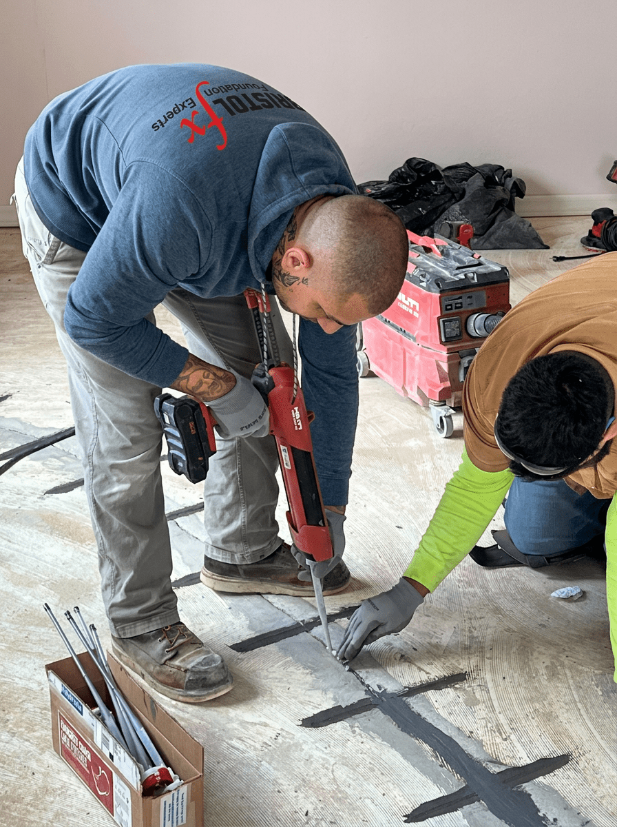 Installing carbon fiber staples to repair a concrete crack