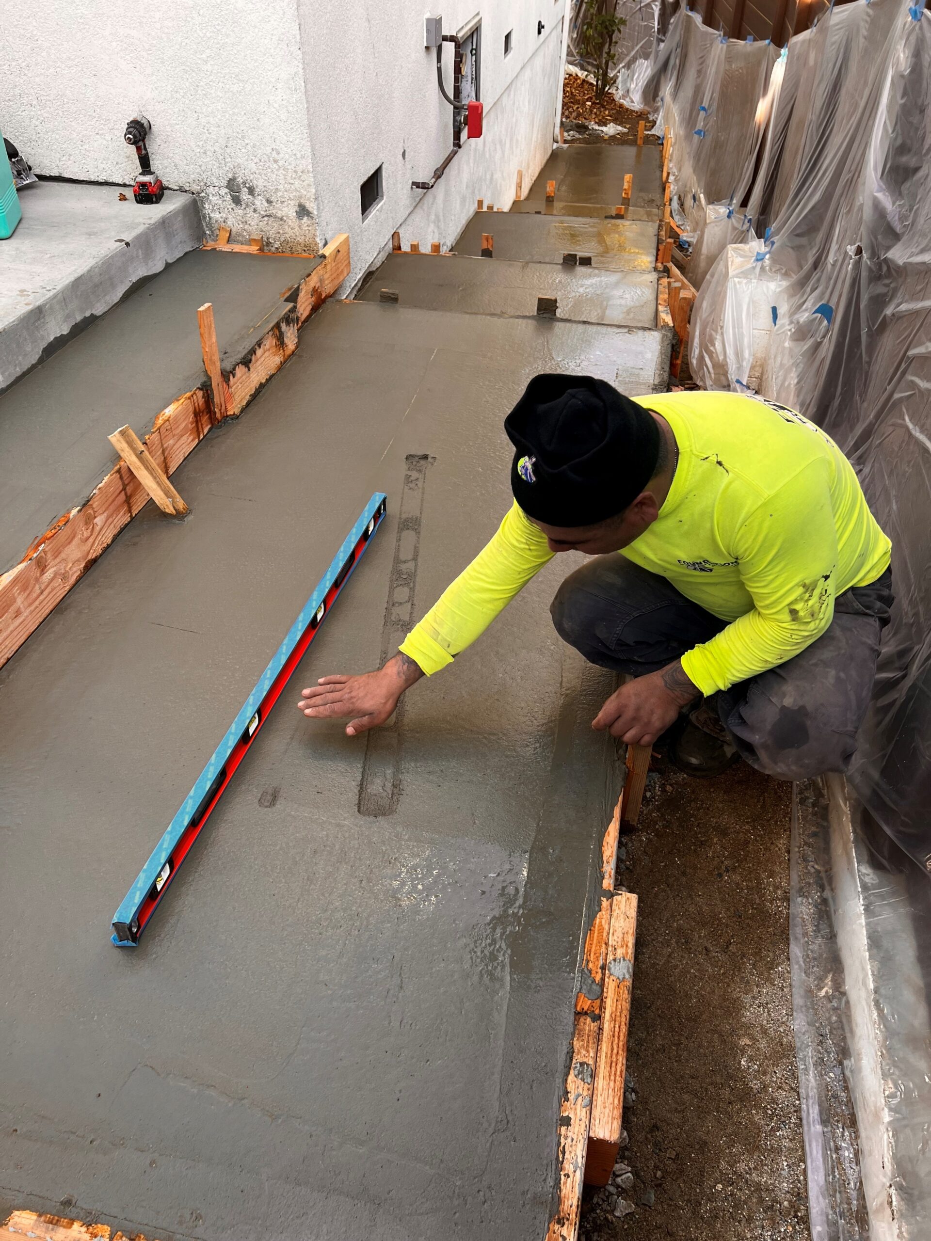 Bristolfx crew finishing a freshly poured concrete slab replacement